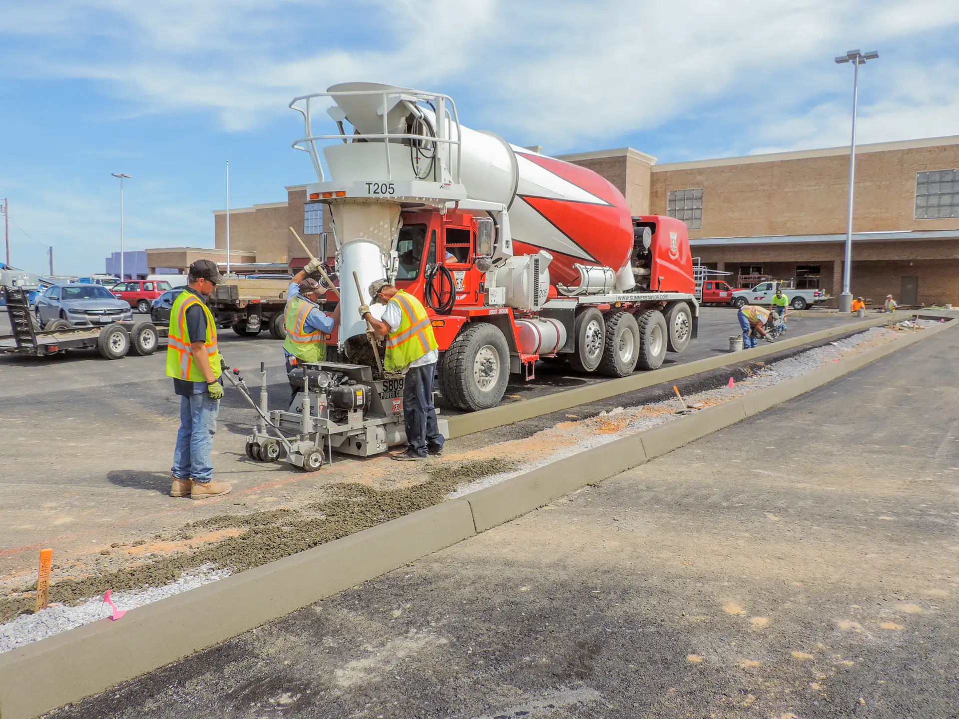 Summers-Taylor's 150 crew makes quick work of this supermarket parking lot.