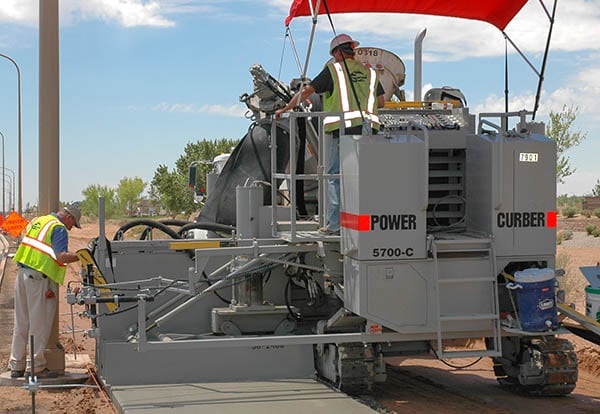 5700-C Curb Machine making a sidewalk