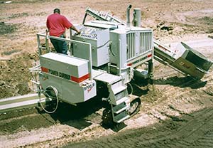 Power Curbers 5700-Super-B curb machine paving a curb