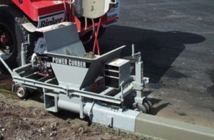 extruded curb with curb machine