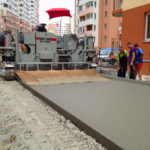 power curber machine creating curb and paving roads