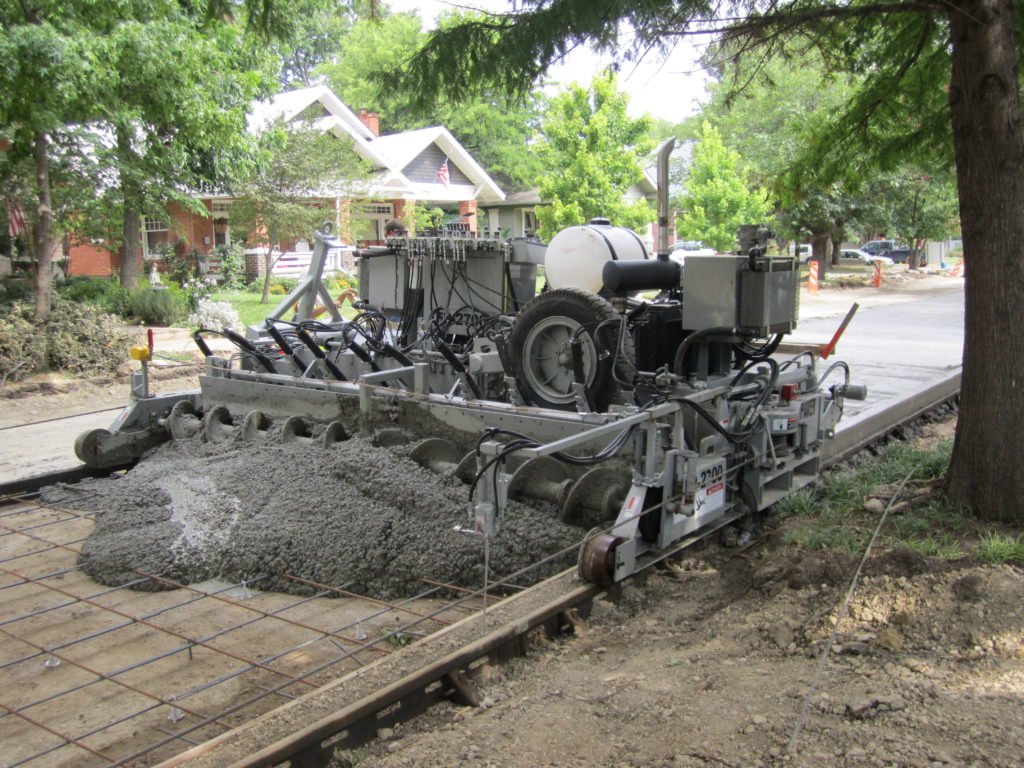 Power Paver FP-2700 paving a residential street