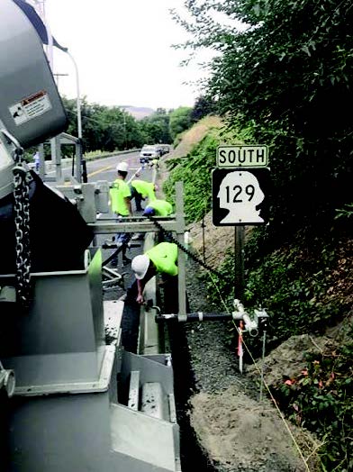 Knox Concrete team working on Washington Interchange Project with Power Curber 5700-B