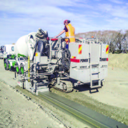 A E Smith Contractors pouring wide curb and gutter with the 5700-C