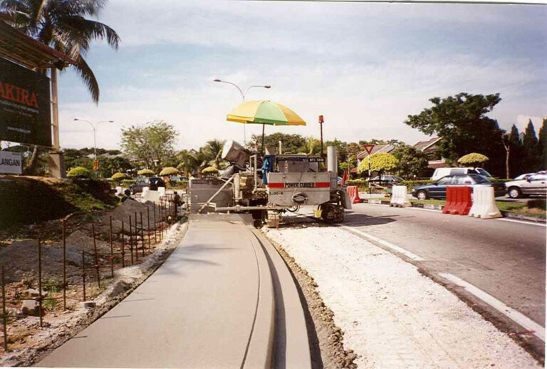 construction team laying sidewalk